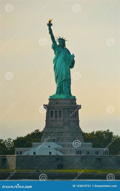 Statue of Liberty during the Sunset Stock Image - Image of boat, center ...