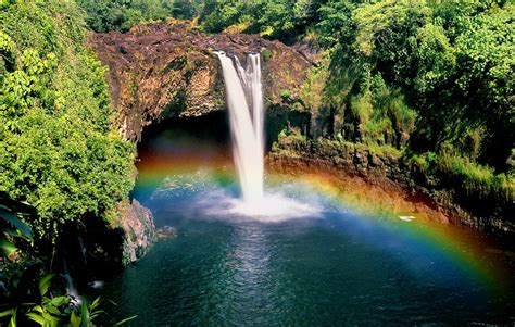 15 Places You'd Probably Rather Be Right Now | Rainbow falls hawaii, Incredible places, Rainbow ...