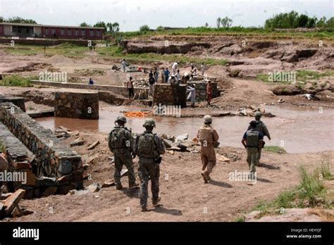 NANGARHAR PROVINCE, Afghanistan– Members of the Nangarhar Provincial Reconstruction Team inspect ...