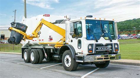 Here's How Trash Truck Robot Arms, Automated Side Loaders, Work