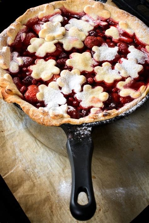 Fresh baked red fruit pie in the ... | Stock image | Colourbox