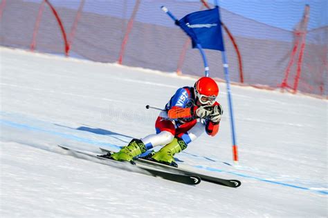 Skiing on big slalom trace editorial photography. Image of season ...