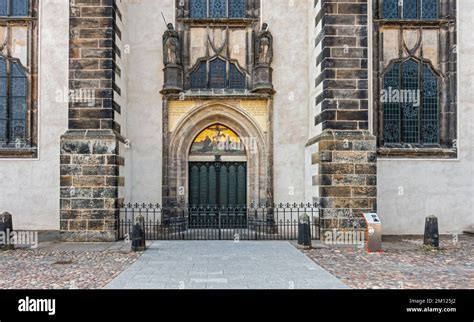 Thesis door at the Castle Church in Wittenberg. On the door, is the text of Luther's 95 theses ...