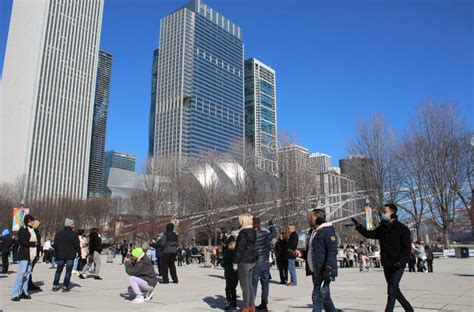 People Stroll through Millennium Park in Winter in Chicago, Illinois ...