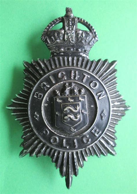 A BRIGHTON POLICE BADGE