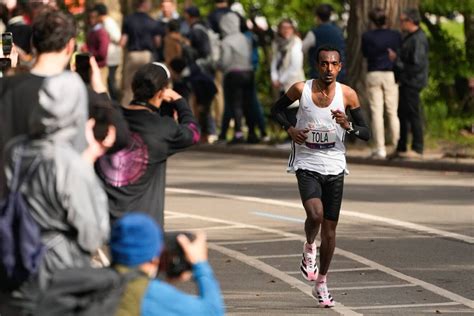 Tamirat Tola sets NYC Marathon course record to win men's race; Hellen Obiri takes women's title ...