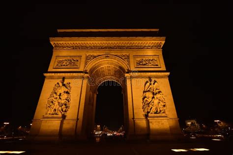 Close-up Shot of the Arc De Triomphe Illuminated in the Night Lights ...