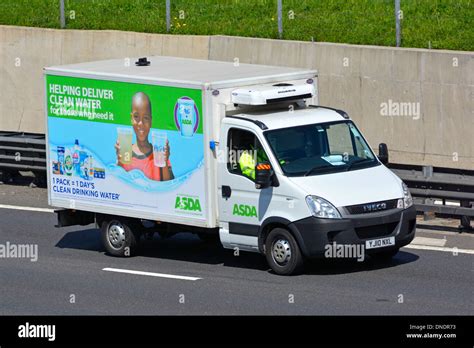 Asda home delivery van with advertising for clean water provision for ...