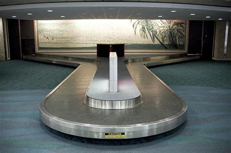 Airport Baggage Carousel Photograph by Henry Lederer