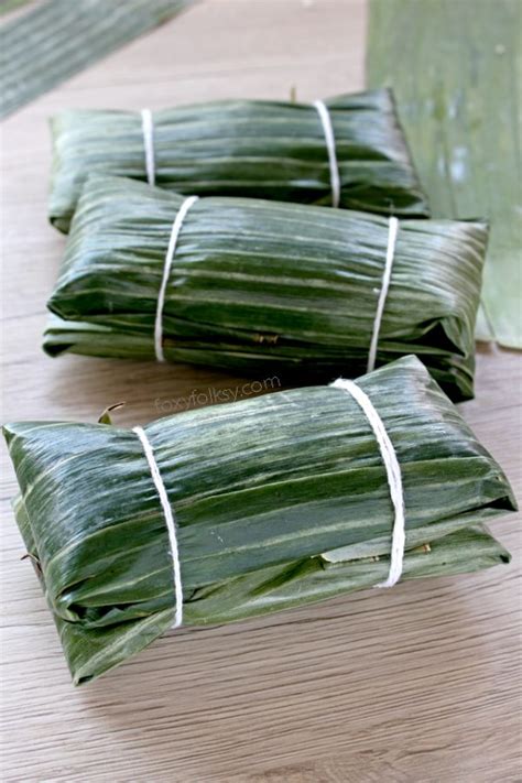 Suman sa Lihiya. With Latik and grated coconut or Latik sauce