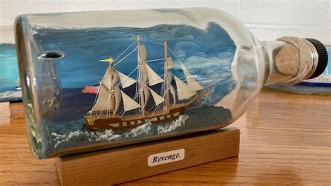 Orkney exhibition celebrates the art of building ships in bottles - BBC News