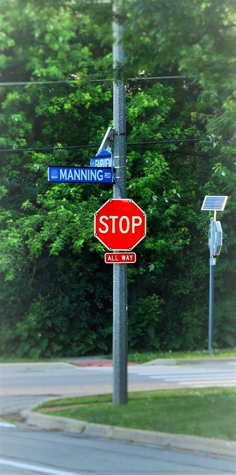 Solar Powered Stop Signs. Mounted on two different types of poles. | Traffic signs, Solar power ...