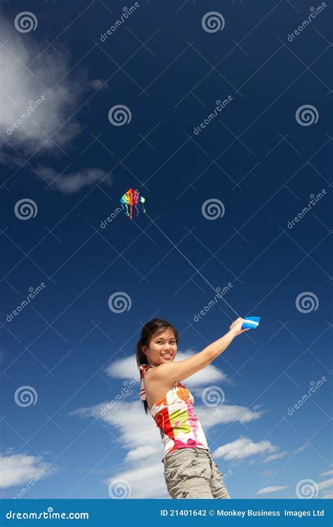 Teenage girl flying a kite stock photo. Image of happy - 21401642