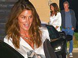 Cindy Crawford looks in good spirits as she enjoys a dinner date wi...