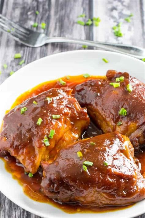 BEST Crockpot BBQ Chicken Thighs Ever • Dishing Delish