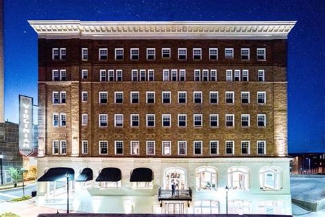 an old building is lit up at night