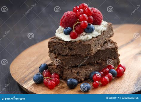 Chocolate Brownie Cake with Nuts and Berries on Wooden Board Stock Image - Image of currants ...