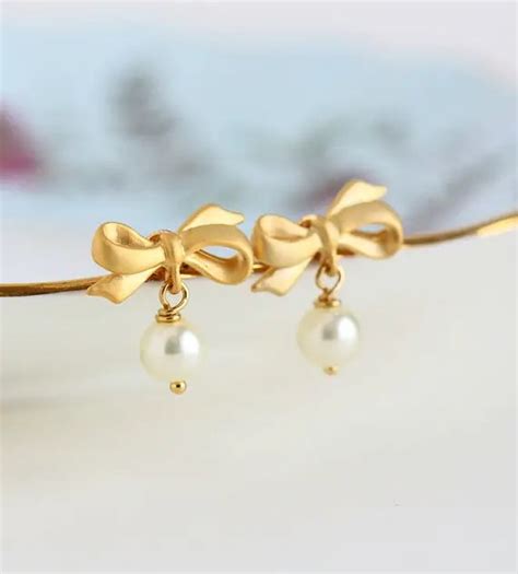Pearl Earrings with Bow Embellishment