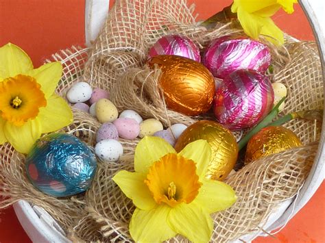 Colorful Easter egg and daffodil on hessian Creative Commons Stock Image