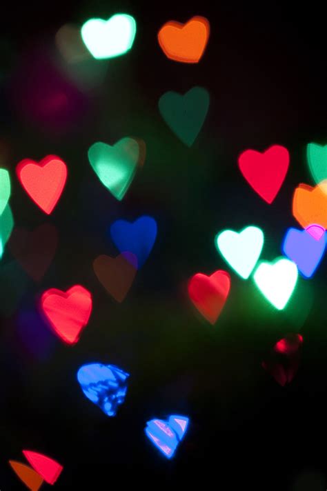 Free Image of Colorful heart-shaped party lights | Freebie.Photography