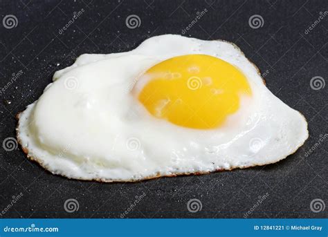 Sunnyside Up Fried Egg stock image. Image of cooked, shiny - 12841221