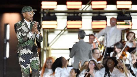 Pharrell Williams makes Louis Vuitton debut at star-studded show in Paris - ABC News