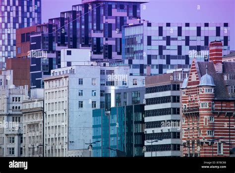 Liverpool Skyline at night showing the Unity Building with a pink sky ...