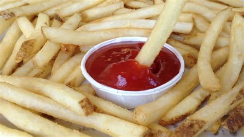 French Fries Dipped In Ketchup Stock Footage Video 3602918 - Shutterstock