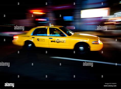 Ny Taxi At Night In Manhattan, New York, Usa Stock Photo - Alamy