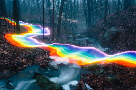 Vivid Rainbow Roads Trace Illuminated Pathways Across Forests and ...