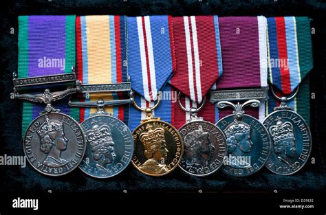 British Army medals and ribbons on black velvet Stock Photo - Alamy