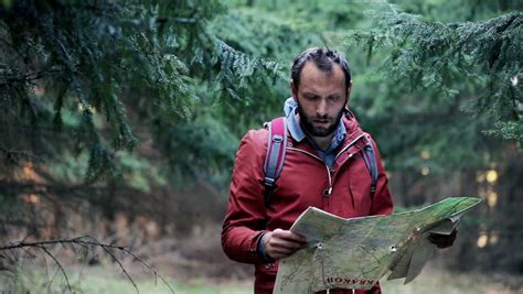 A Lost Young Man Looking For Direction In The Forest Stock Footage Video 10026314 | Shutterstock