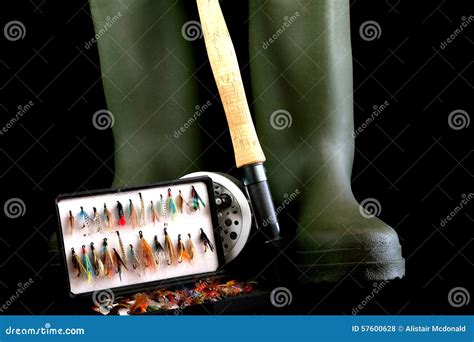 Angling Equipment on Black Background Stock Photo - Image of relaxing, reel: 57600628