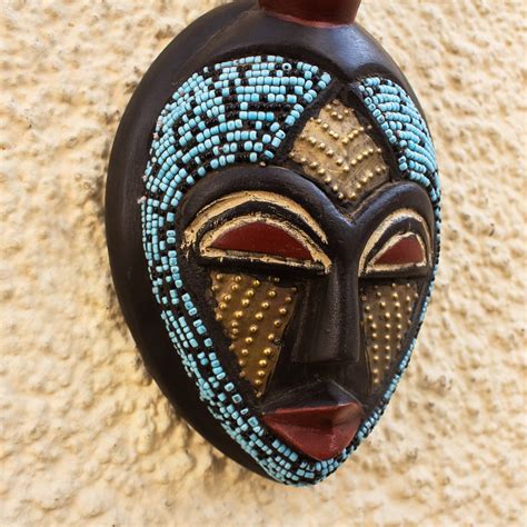 Hand Carved African Wood Mask with Brass and Glass Accents - Ato | NOVICA