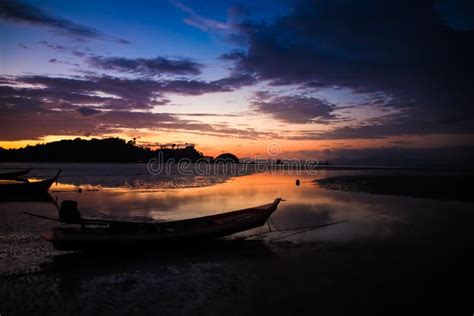 Beautiful Sky and Sunset on the Beach with Fishing Boat Silhouette ...