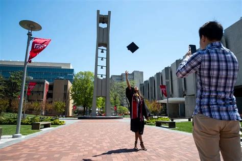 No pomp and circumstance on Temple’s commencement day, but lots of champagne popping and photos ...