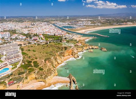 Aerial view of golden coast cliffs of portuguese southern beaches in ...