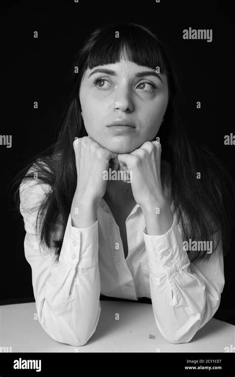 Girl daydreaming table Black and White Stock Photos & Images - Alamy