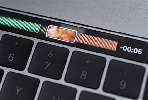 This New MacBook Pro Includes An Instant Emoji Touch Bar & Loads More ...