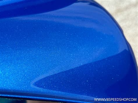 Blue Metallic Car Paint Surface Wallpaper Stock Photo