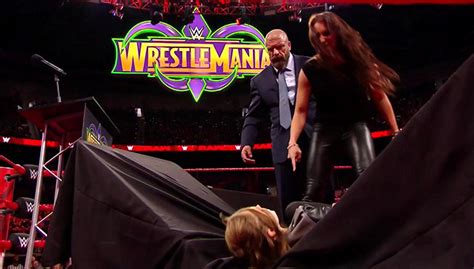 Stephanie McMahon Puts Ronda Rousey Through a Table on RAW (Pics, Video ...