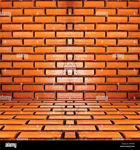 Bricks wall burnt orange background Stock Photo - Alamy