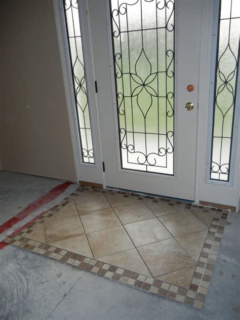 Front Door (foyer) Tiled "Rug" area | Floor tile design, Ceramic floor tile, Entryway tile