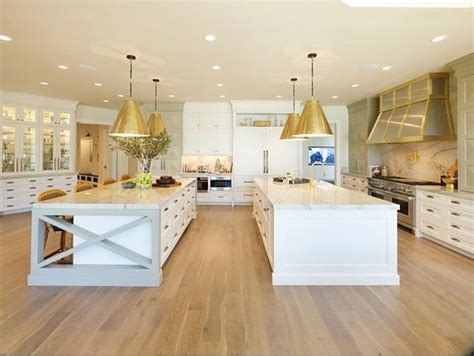 Don’t you just love a kitchen with double islands?! By @mcewancustomhomes @alicelaneinteriors ...