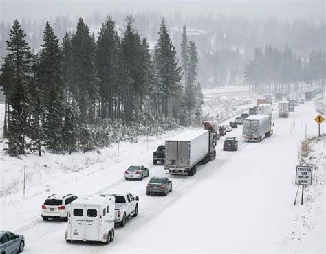 Eastbound traffic crawls over Donner Summit on the Interstate 80 near Soda Springs, California ...