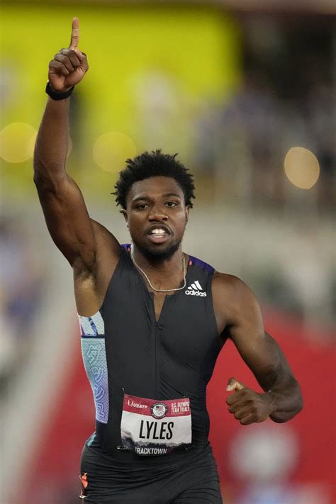 Noah Lyles celebrates after winning the final in the men’s 200-meter ...