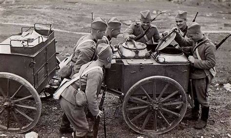 Serbian soldiers checking on their lunch WWI