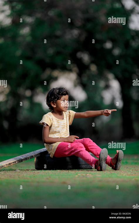 Indian children playing cricket hi-res stock photography and images - Alamy