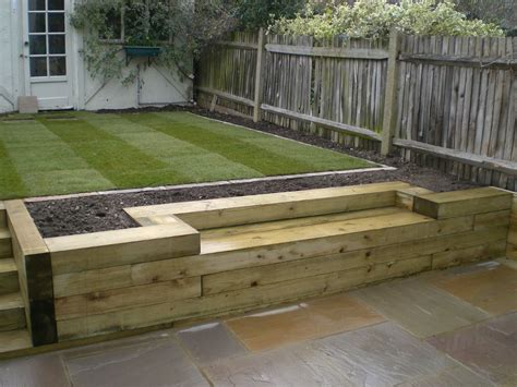 Sleep edging with bench | Sleepers in garden, Garden seating, Backyard