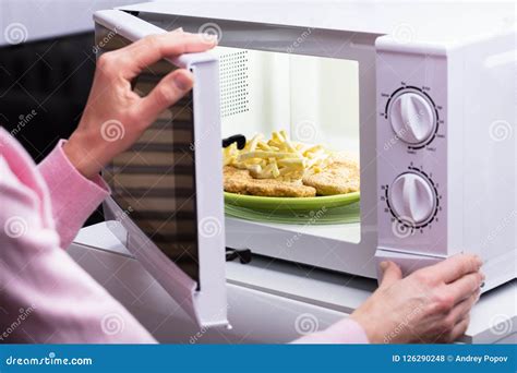 Woman Heating Food in Microwave Stock Photo - Image of house, french ...